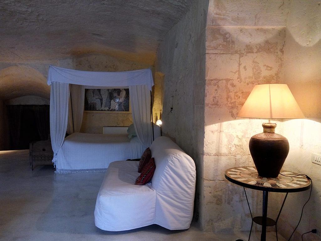 Апартаменти Casa Grotta Le Terrazze Матера Номер фото