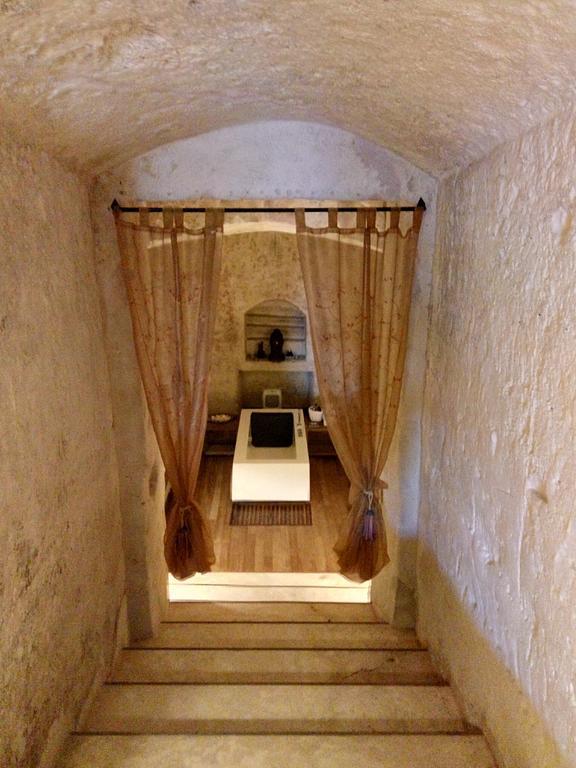 Апартаменти Casa Grotta Le Terrazze Матера Номер фото